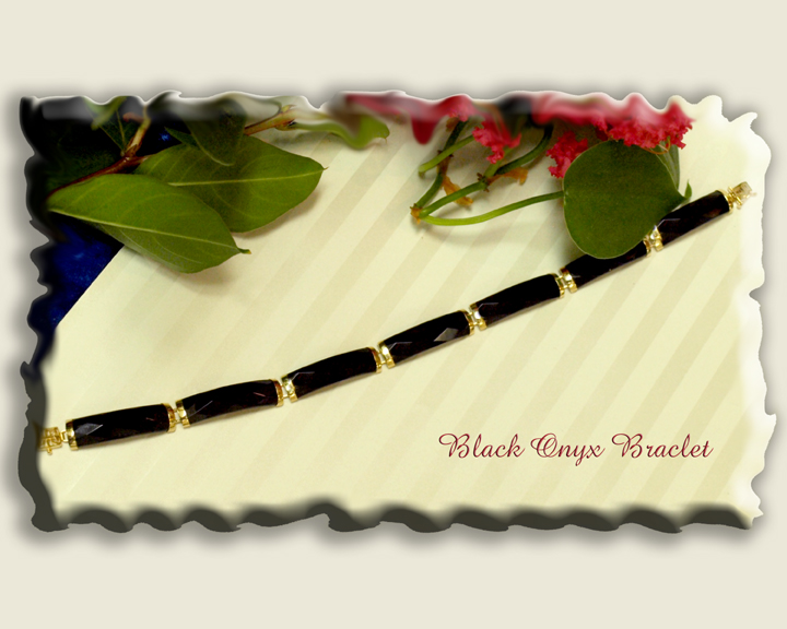 <b>Description: </b>14KY Faceted Cut Black Onyx Bracelet Call for pricing